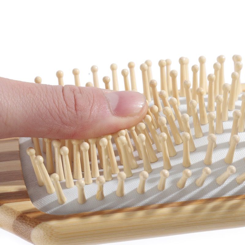 Wooden paddle brush